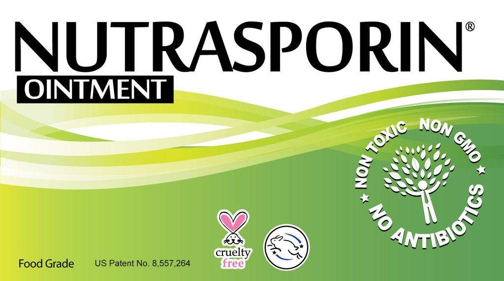 Nutrasporin all natural first aid ointment packaging with cruelty-free, non-toxic, non-GMO, and no antibiotics claims
